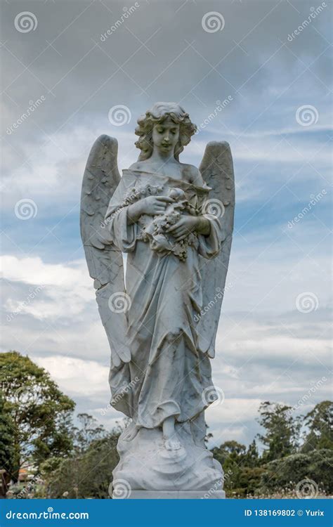 Grieving Angel Statue on a Family Grave Stock Photo - Image of family ...