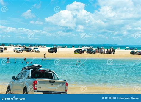 4wd Vehicles at Rainbow Beach with Coloured Sand Dunes, QLD, Australia ...