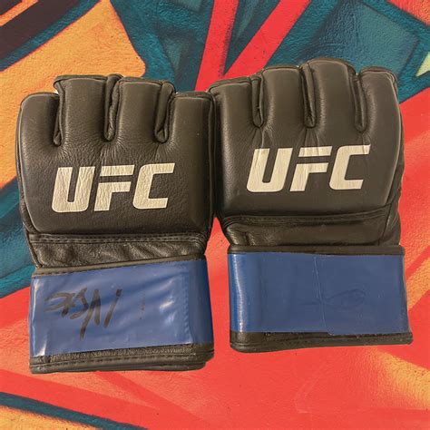 UFC Fight Worn Gloves Signed by Thiago Moises | MILLIONS