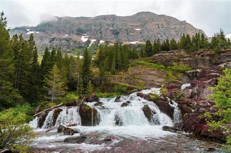 Redrock Falls Along Swiftcurrent Pass Hiking Trail In Glacier National