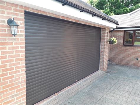 Roller Garage Door vs Sectional Garage Door - Which is best for me? | Associated Garage Doors