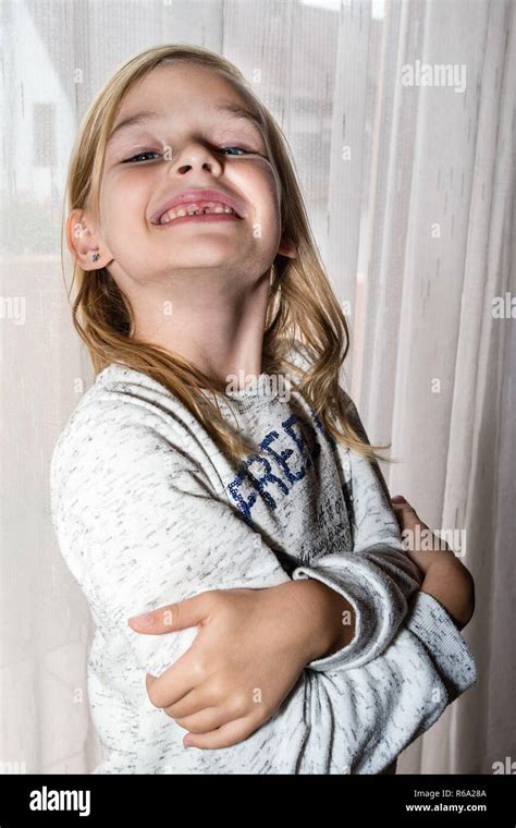 year  girl   missing upper incisor smiling