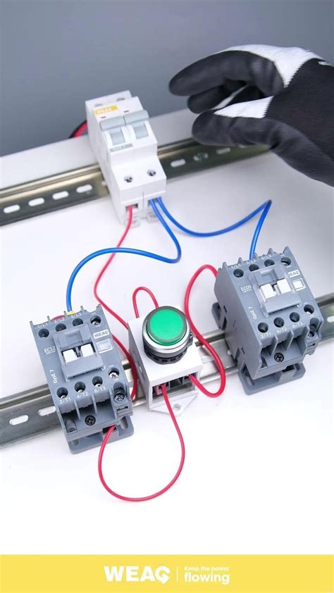 A Push Button Switching Between Two Magnetic Contactors In An Industrial Control System Video