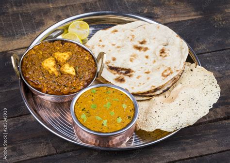 Indian Traditional Thali Food Dal Makhani Served With Chapati Papad