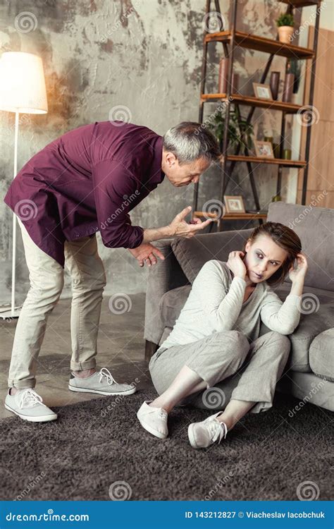 Grey Haired Old Man Yelling On Frightened Wife While Being Drunk And