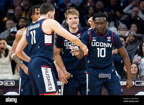 UConn S Hassan Diarra Right Celebrates With His Teammates After