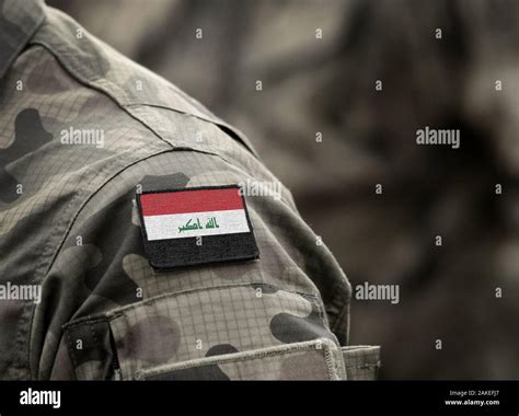 Flag of Iraq on military uniform. Republic of Iraq. Army, armed forces ...