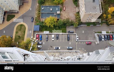 Empty parking lots in front of buildings, aerial view. Courtyard of a ...