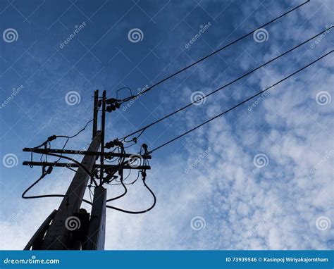 Electric Pole Power Lines And Wires With Blue Sky With Lamp Stock