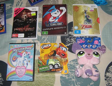 DVDs, Wii Games, And Toys by CheerBearsFan on DeviantArt