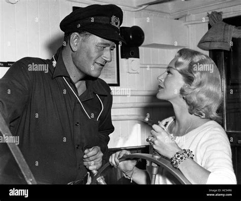 THE SEA CHASE, John Wayne, Lana Turner, 1955 Stock Photo - Alamy