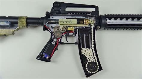 Airsoft Electric Gun (M4) : r/ThingsCutInHalfPorn