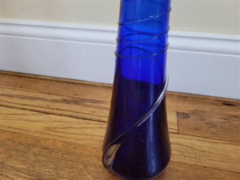 Tall Blue Glass Vase Antiques Board