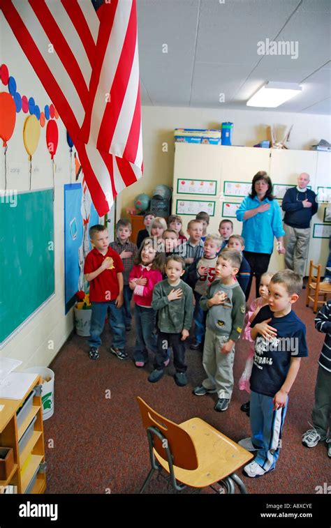 Children say pledge of allegiance to the American flag in pre nursery ...