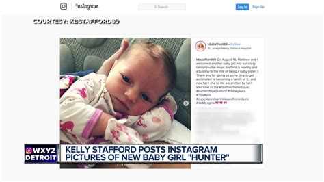 Photo shows Staffords with their new daughter