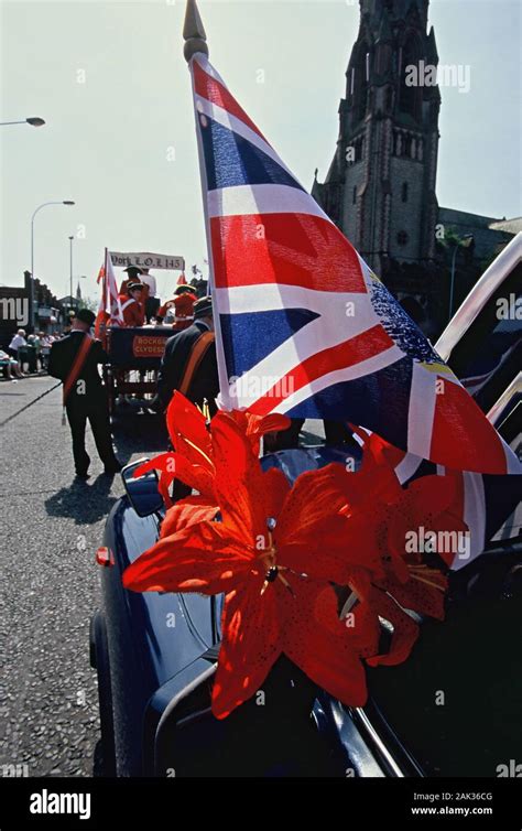 During The Battle Of Boyne Day Protestants Walking With British Flags