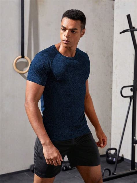 Manfinity Fitness Camiseta deportiva para hombre con mangas raglán y