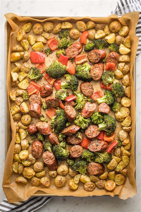 Sheet Pan Chicken Sausage With Broccoli Peppers And Potatoes Nourish And Fete