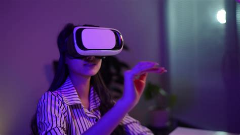 Woman using virtual reality headset and looking around at interactive