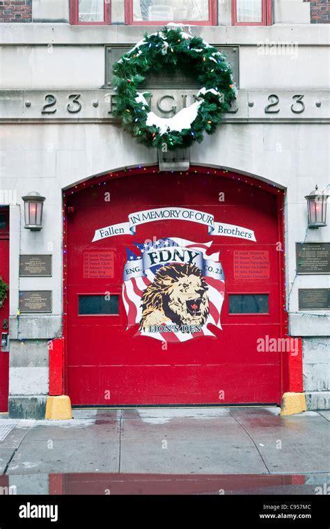 exterior FDNY Engine Company 23 Lions Den fire station decorated for ...