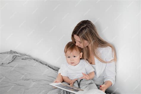 Premium Photo Nanny Reading A Book To A Child