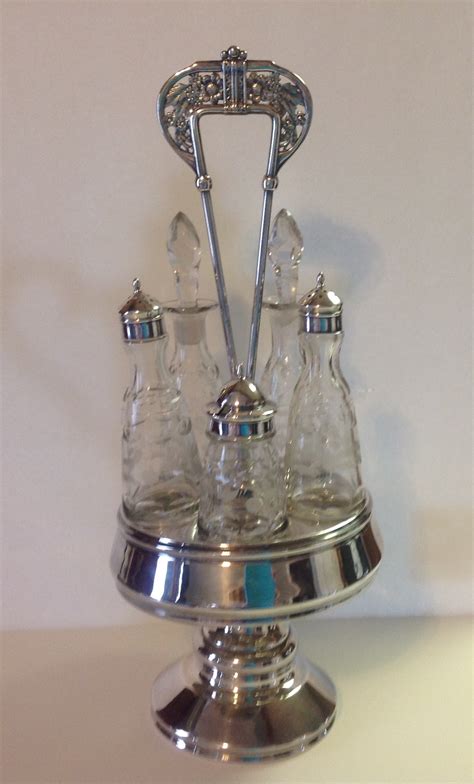 GORGEOUS ANTIQUE MERIDEN SILVER PLATE CASTOR CRUET SET For Sale