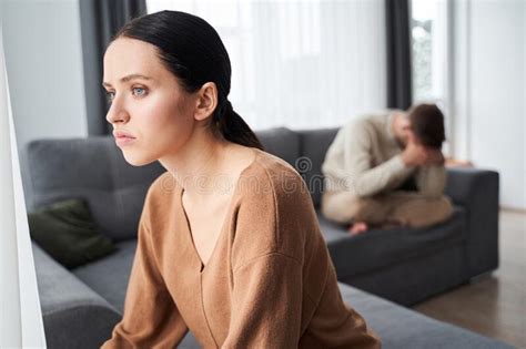 Couple Sitting On The Sofa After A Quarrel Stock Image Image Of