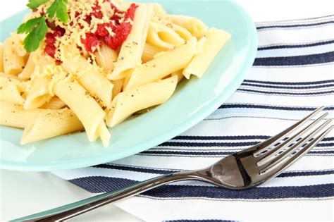 Premium Photo Rigatoni Pasta Dish With Tomato Sauce Close Up