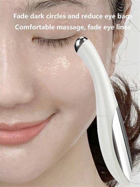 Stylo de massage des yeux électrique pour la réduction des cernes et