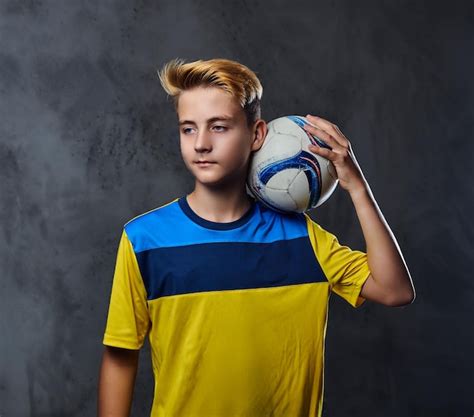 Premium Photo Portrait Of Blond Teenager Soccer Player Dressed In A