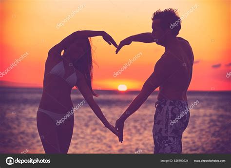 Lovers Holding Hands Sunset