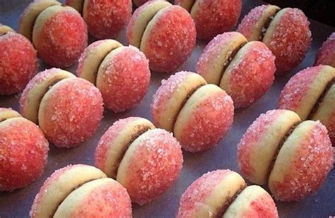 Some Sugar Covered Cookies Are Sitting On A Baking Sheet