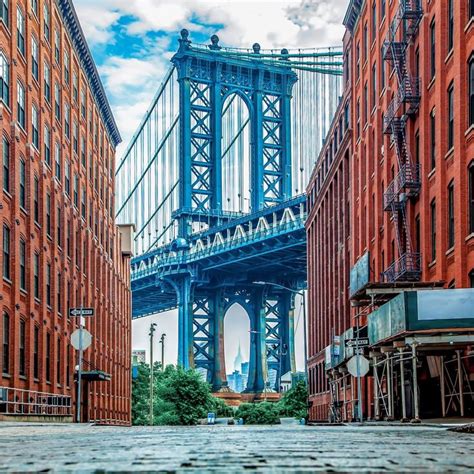 An Image Of A Bridge That Is Going Over The Water In New York City Ny