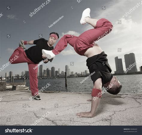 Men Performing Acrobatic Breakdance Moves Stock Photo 35696422 : Shutterstock