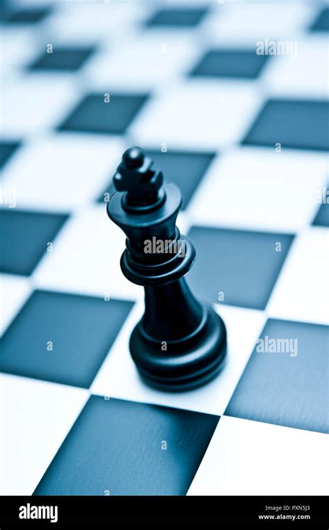 black chess KIng piece on the chessboard Stock Photo - Alamy