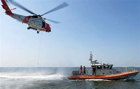 Coast Guard Rescue 2 Boaters And Is Search For 1 Off Grand Isle