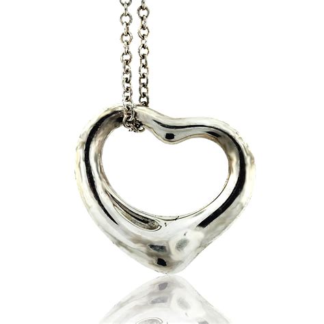 Tiffany And Co Small Sterling Silver Open Heart Pendant