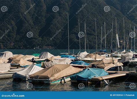 Boats Moored On Lake Lugano Editorial Stock Image Image Of Covered