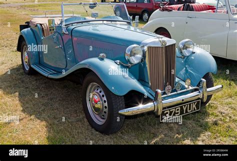 Three Quarter Front View Of A Blue 1953 MG TD Midget On Display At