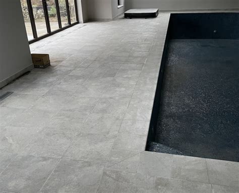 Glass Mosaic To Internal Pool And Textured Porcelain To Pool Surround