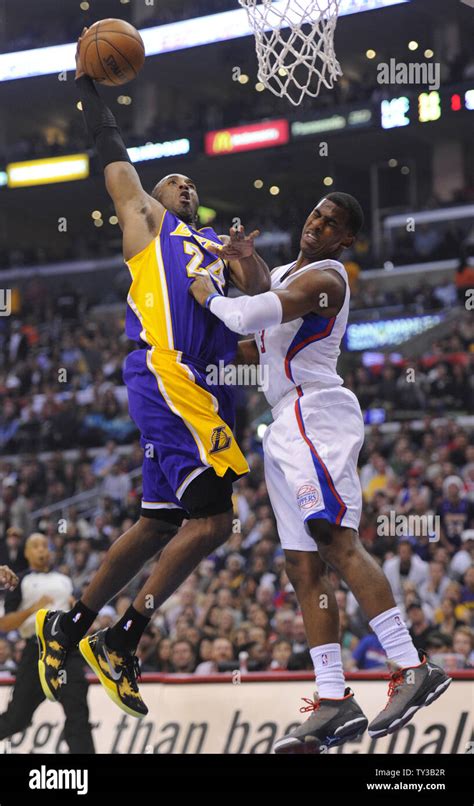 Los Angeles Lakers Shooting Guard Kobe Bryant 24 Dunks Over Los Angeles Clippers Point Guard