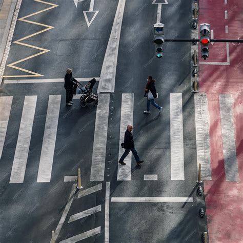 Premium Photo | Pedestrian crossing the crosswalk in bilbao city