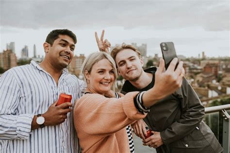 Premium Photo Friends Taking A Group Selfie