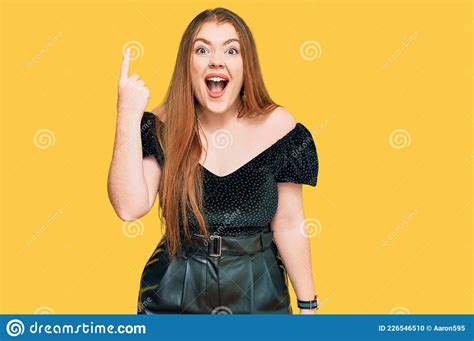 Young Beautiful Redhead Woman Wearing Elegant Clothes Pointing Finger