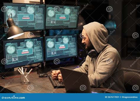 Angry Mad Hacker Punching Keyboard After Failing To Hack Stock Image