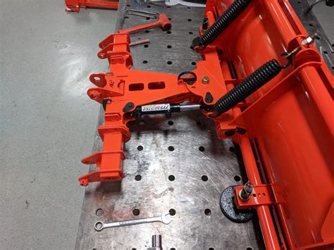 Quick attach snow plow attachments - BX - Kubota loader mounted plow