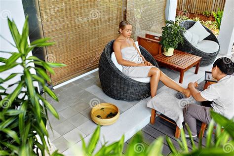 Spa Foot Massage Body Care Treatment Woman Relaxing In Salon Stock Image Image Of Massager