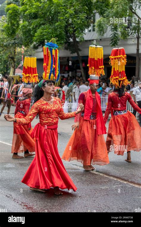 Kavadi Dancers (Hindu) perform along a street of Kandy in Sri Lanka ...