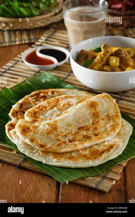 Roti Canai And Straits Chicken Curry Malaysia Food Stock Photo Alamy