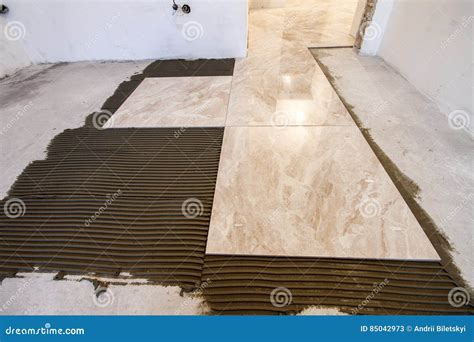 Ceramic Tiles. Floor Tiles Installation Stock Image - Image of manual ...